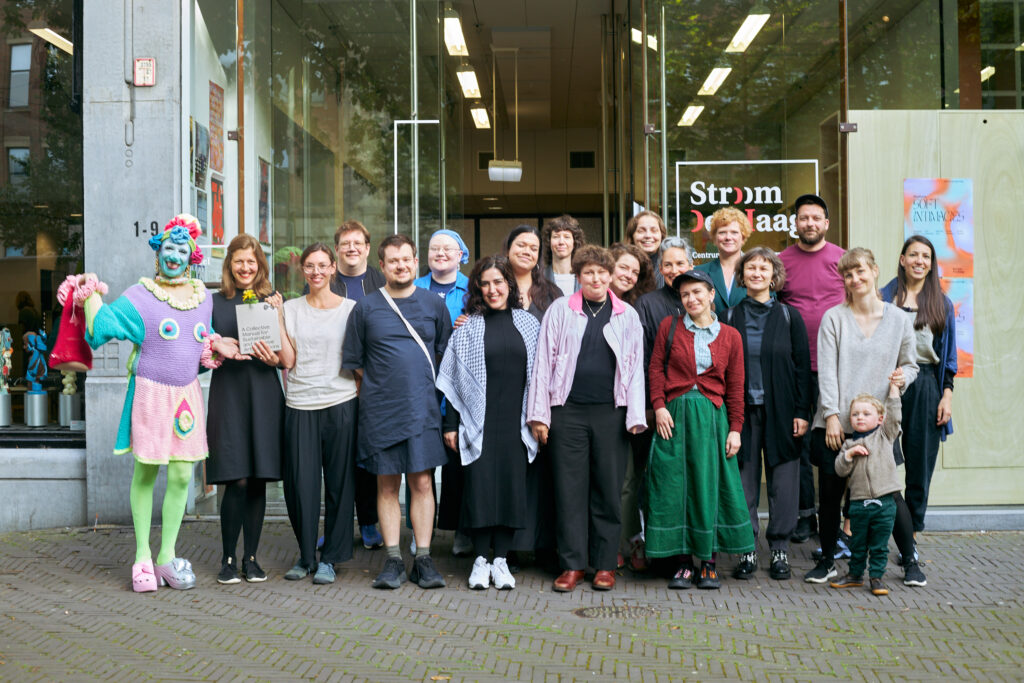 A group photo in front of Stroom Den Haag art centre.